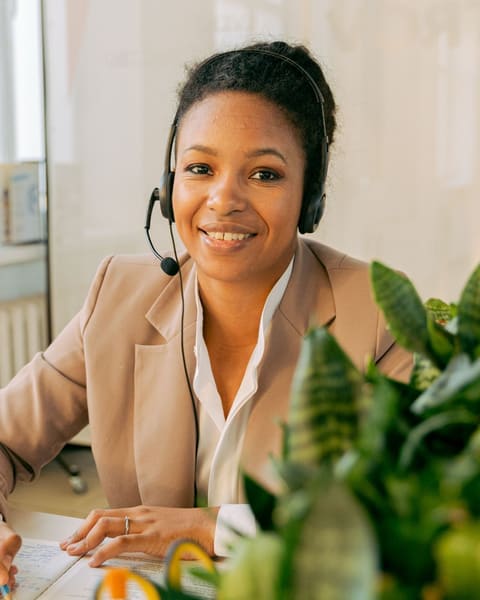 Smiling receptionist in a headset